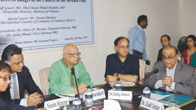 Former Finance Minister AMA Muhith looks on as Dr. Zaidi Sattar provides his views on macroeconomic issues in an event hosted by PRI